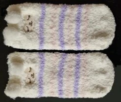 Chaussettes De Noël Pour Bébé Blanches Avec Un Joli Visage D'animal Emballées Dans Un Emballage Super Mignon Que Vous Pouvez Accrocher Dans Le Sapin De Noël. -Jingle Bells Boutique 1200x1008